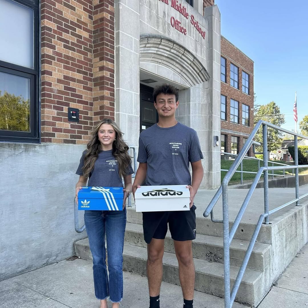 Student representative delivering shoes